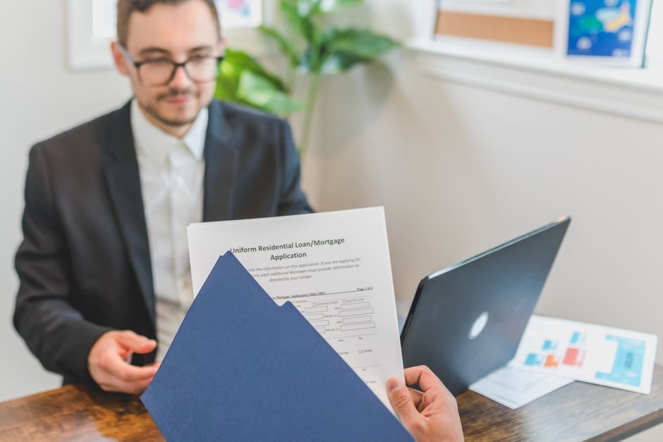 Stack of documents needed for loan processing