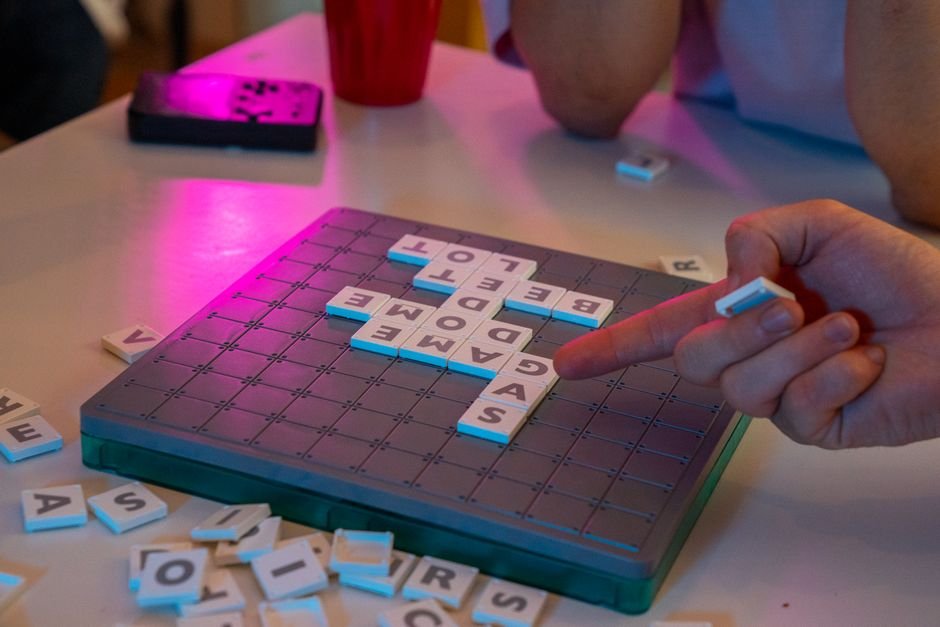 people playing word games to overcome word hurdles